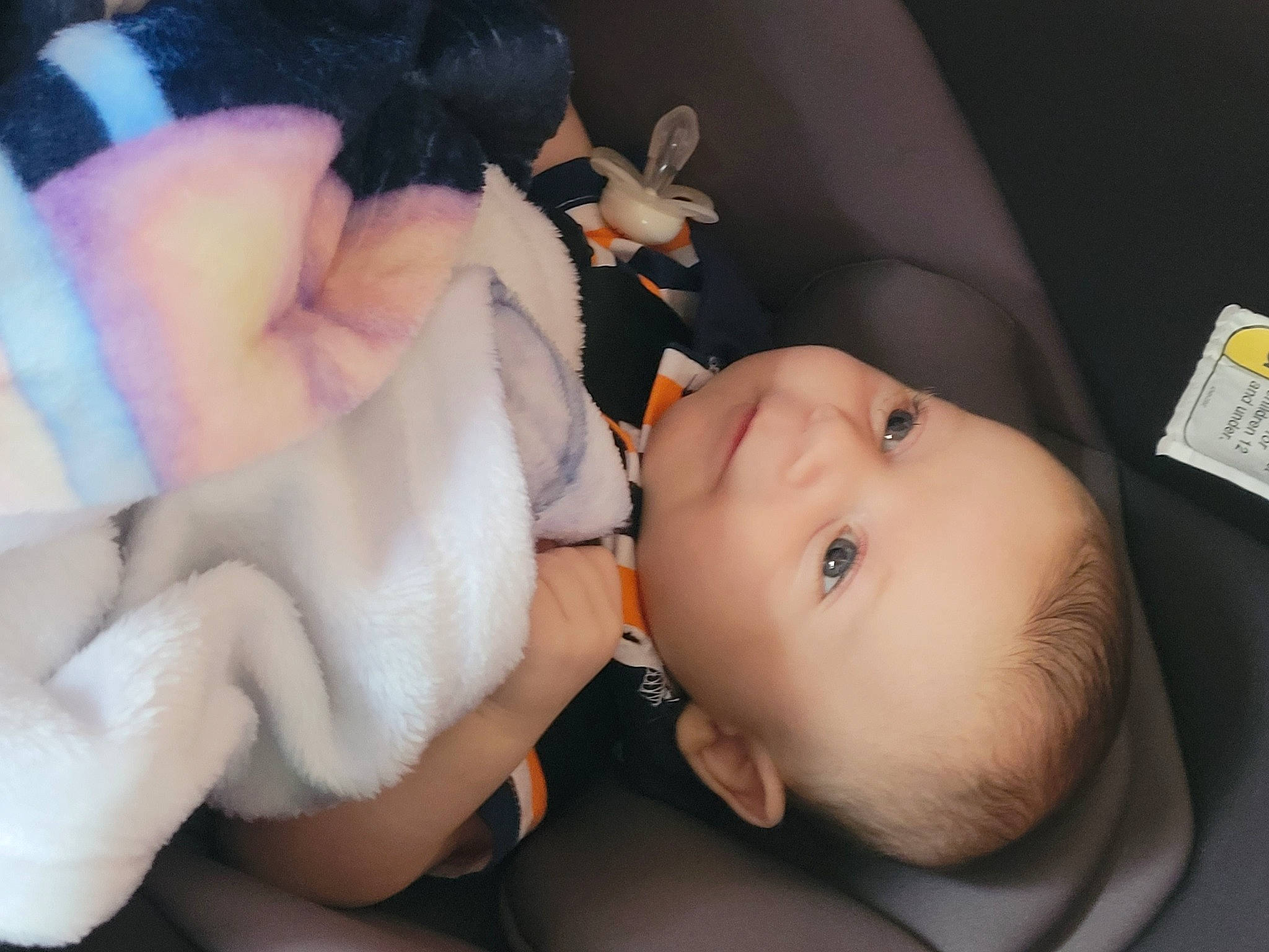 Ryan is registered to the contest to win money with this photo: baby, baby_products, baby_safety, baby_toddler_clothing, cheek, child, comfort, ear, eyelash, finger, fur, mouth, nail, nose, person, skin, textile, toddler, toy