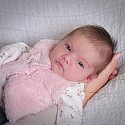 Genesis joined the competition — help win amazing prizes! baby, infant, pink_vest, floral_clothing, hand, face, portrait, newborn, soft_texture, blanket, sleepy, cute, resting, child, human, skin, head, expression, closeup, warm