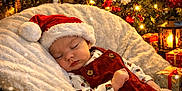 Genesis joined the competition — help win amazing prizes! baby, sleeping, santa_hat, christmas_tree, holiday_decorations, lights, train, blanket, festive, ornaments, red, white, gold, bell, cozy, winter, cute, infant, celebration, gift