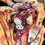 baby, newborn, sleeping, pink, hello_kitty, bow, blanket, mittens, socks, cute, infant, cozy, hand, soft, floral, bed, child, person, rest, comfort
