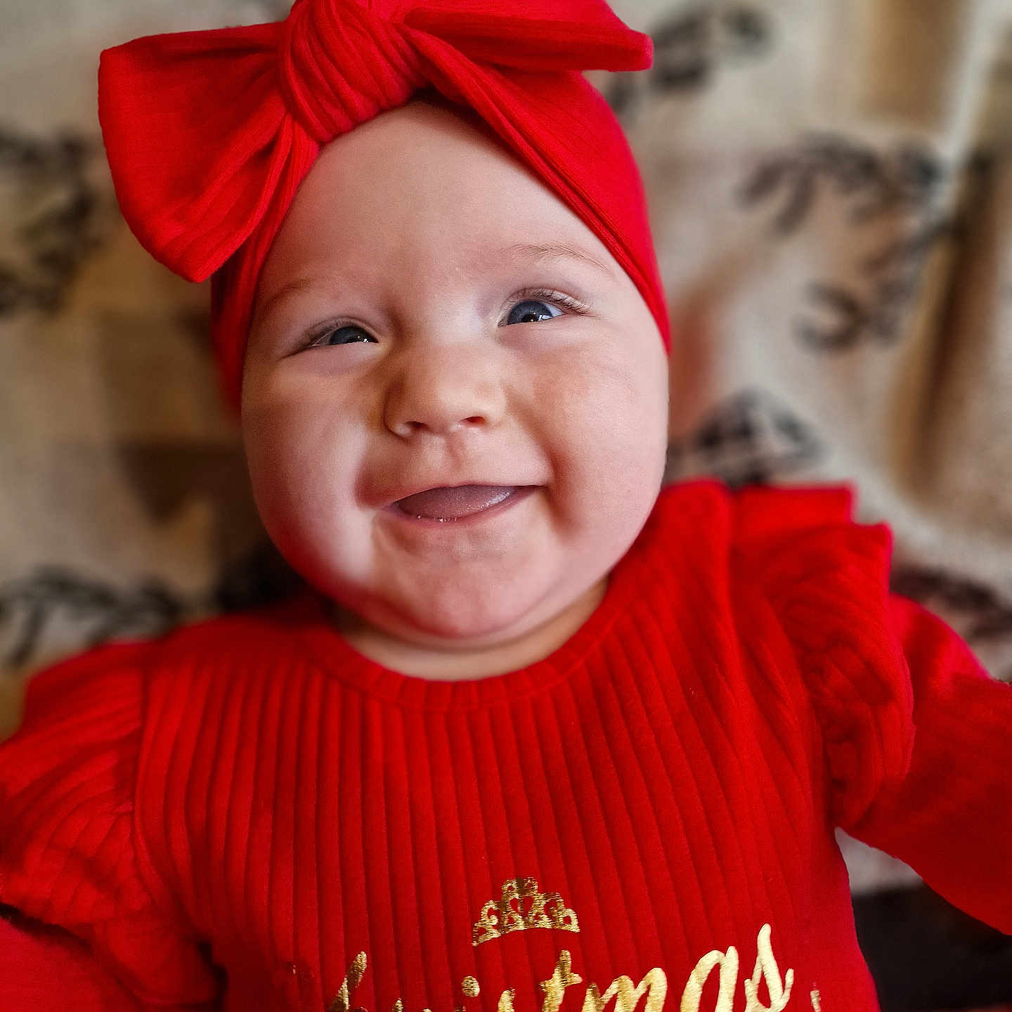 Noelle joined the competition — help win amazing prizes! baby, bodypart, cap, clothing, face, finger, hand, happy, hat, head, hood, hoodie, knitwear, person, photography, portrait, smile, sweater, sweatshirt, turban