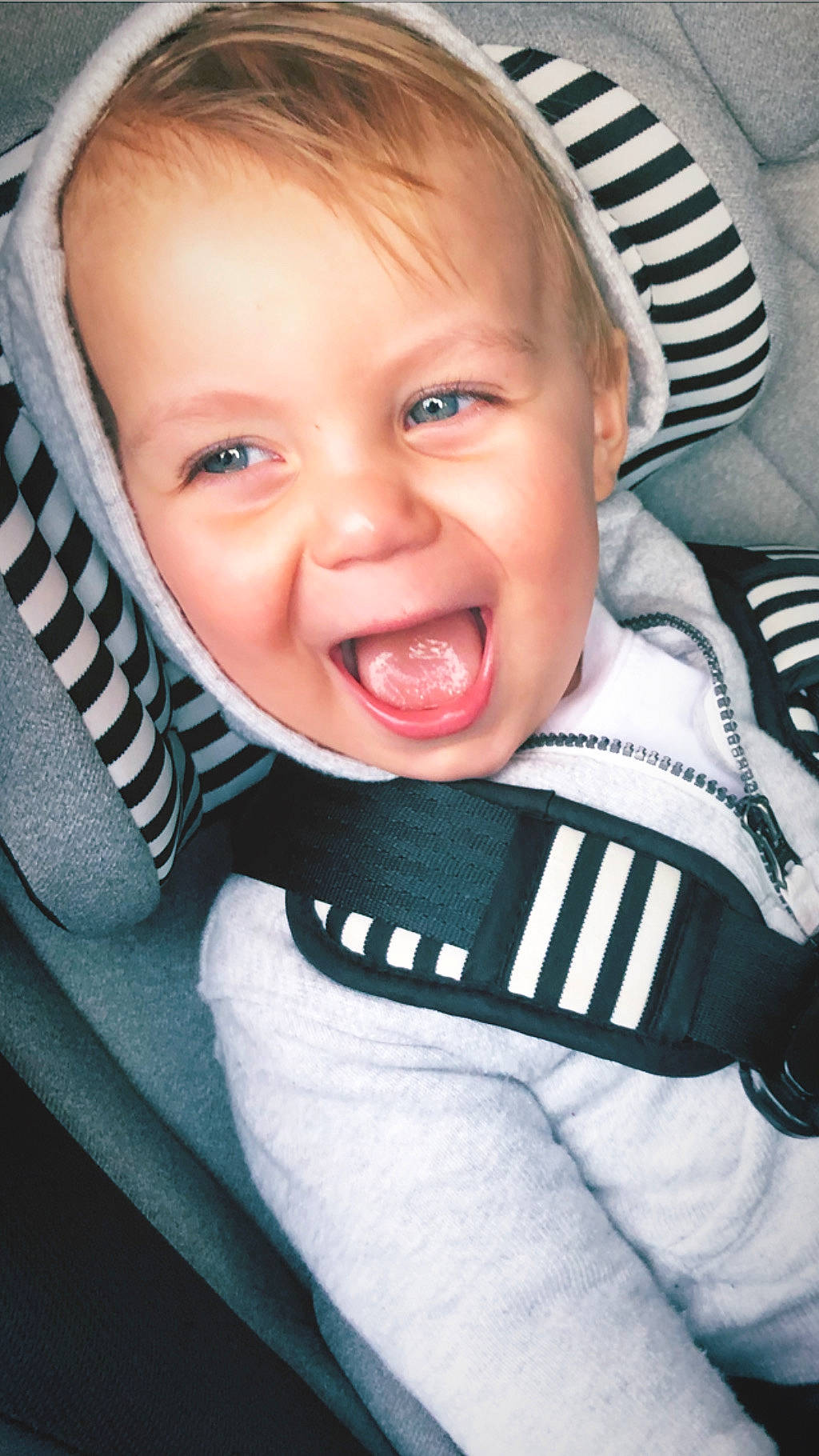 Arrow is registered to the contest to win money with this photo: baby, baby_in_car_seat, baby_laughing, baby_making_funny_faces, car_seat, cheek, child, chin, cool, face, facial_expression, happy, head, laugh, mouth, nose, person, smile, toddler, tongue