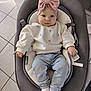 baby, baby_seat, blue, bow, child, cushion, embroidery, floor_tiles, flowers, grey, headband, indoor, infant, pants, person, pink, portrait, socks, sweater, white