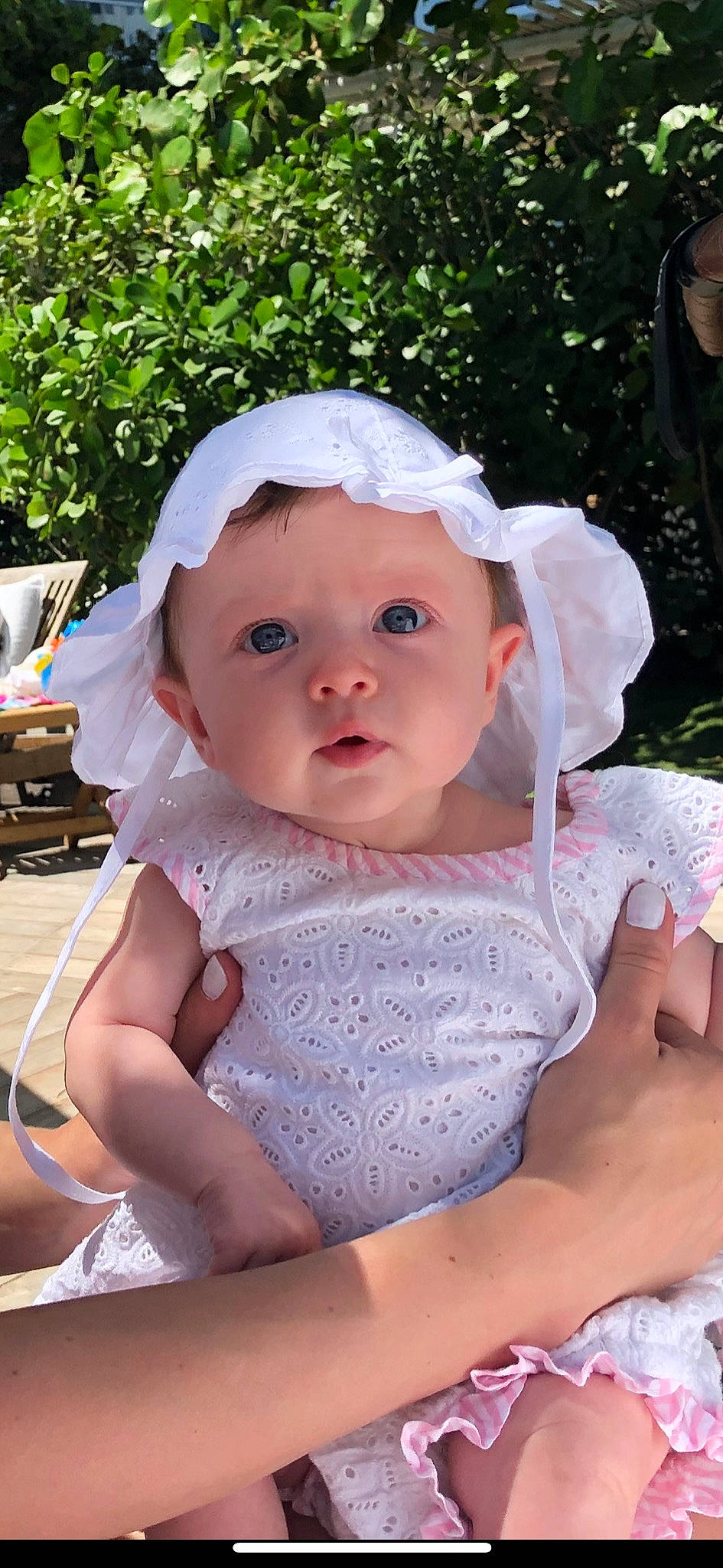 Kendall is registered to the contest to win money with this photo: baby, bonnet, child, headgear, headwear, person, toddler