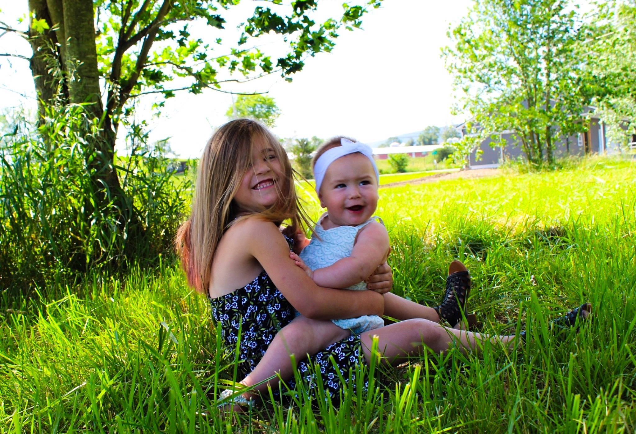 Kambree is registered to the contest to win money with this photo: botany, child, fun, grass, grass_family, green, happy, interaction, joy, meadow, people, people_in_nature, person, photograph, photography, sitting, smile, spring, summer, toddler
