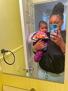 Malani is registered to the contest to win money with this photo: arm, baby, child, event, fun, happy, magenta, mirror, person, play, room, sitting, t_shirt, toddler