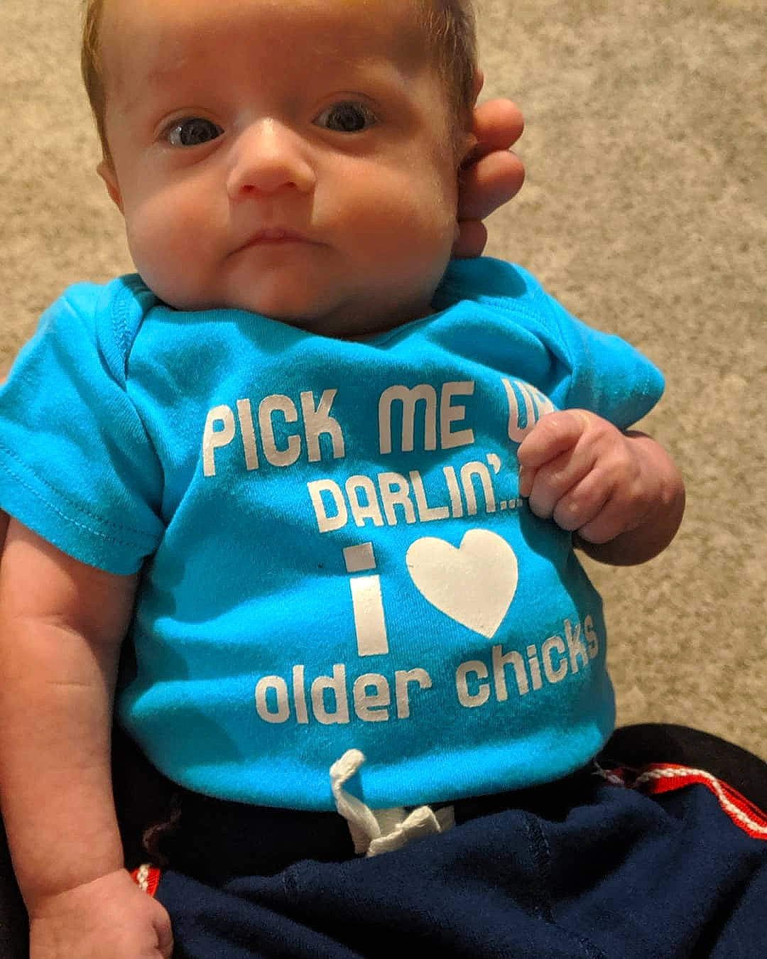 Austin is registered to the contest to win money with this photo: baby, baby_products, baby_toddler_clothing, child, cool, person, product, sleeve, t_shirt, toddler, turquoise