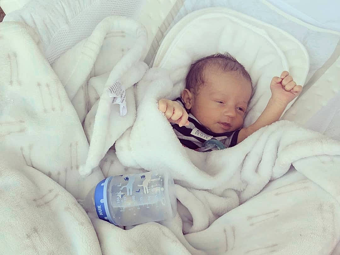 Austin is registered to the contest to win money with this photo: baby, baby_products, baby_sleeping, bedtime, birth, child, comfort, hand, linens, love, nap, person, product, sleep, toddler