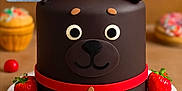 Falco participe au concours pour gagner de l'argent avec cette photo : animal_theme, brown_background, cake, celebration, chocolate, cute, dessert, dog, food, green_star_cookie, inset_photo, orange_cookie, plate, real_dog, red_collar, round_cake, sprinkles, strawberry, sweet, table
