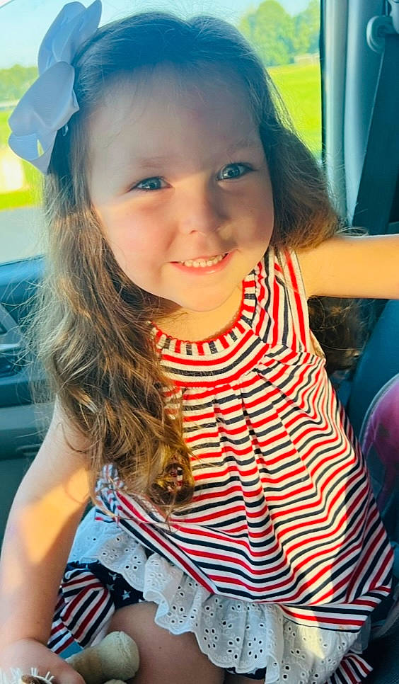 Lily is registered to the contest to win money with this photo: chin, cool, eyelash, face, facial_expression, gesture, hair, hairstyle, happy, head, iris, joy, lip, mouth, neck, person, photograph, shoulder, skin, sleeve