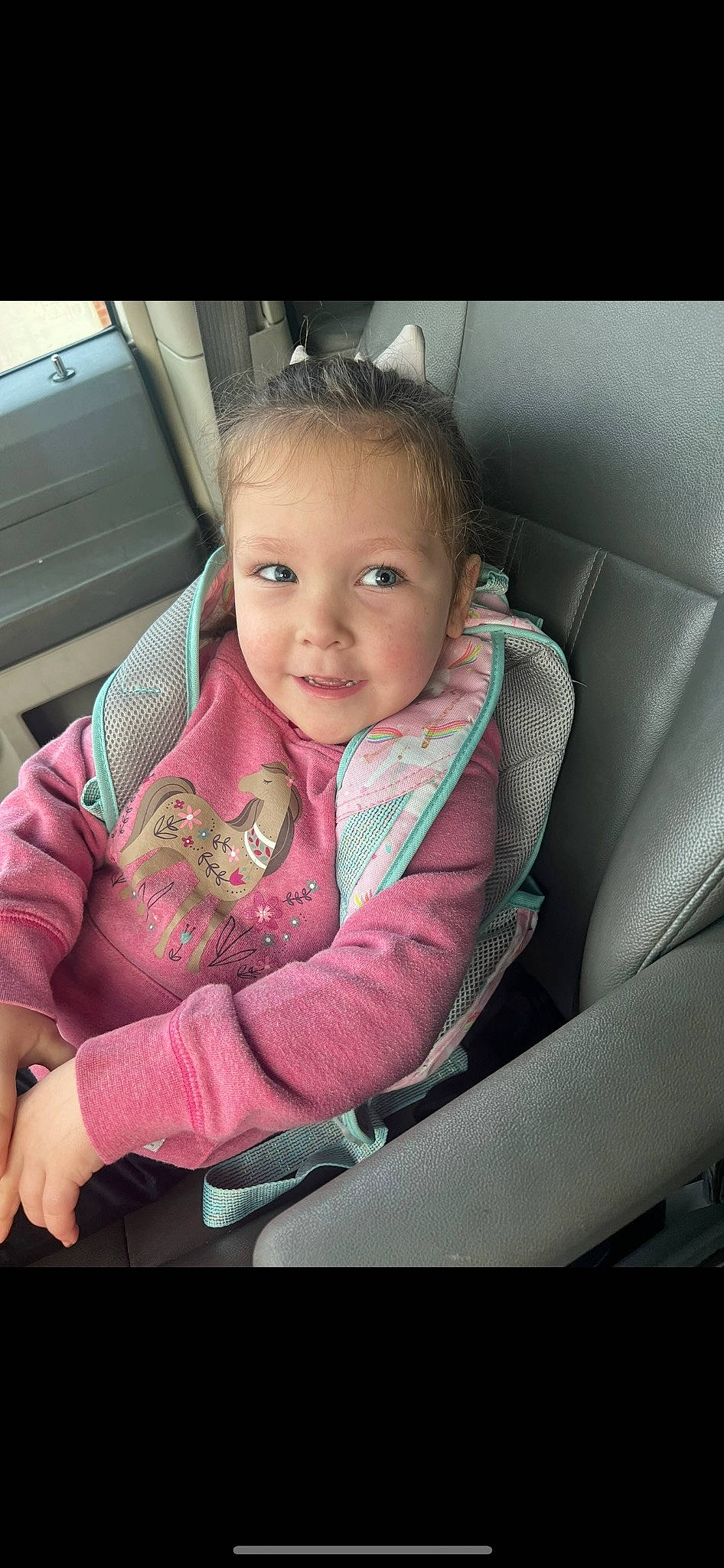 Lily is registered to the contest to win money with this photo: auto_part, car_seat, car_seat_cover, cheek, chin, comfort, cool, finger, flash_photography, happy, iris, lip, mouth, nose, person, seat_belt, skin, smile, toddler, vehicle_door