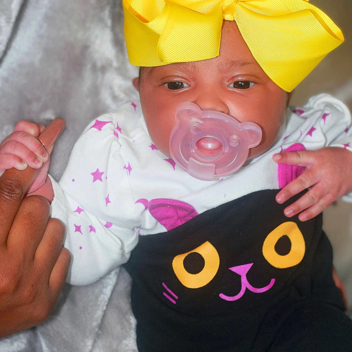 Alaura Sky is registered to the contest to win money with this photo: baby, baby_products, baby_toddler_clothing, cap, child, costume, costume_hat, facial_expression, fashion_accessory, fictional_character, font, fun, gesture, happy, magenta, party_supply, pink, sleeve, toddler, vertebrate