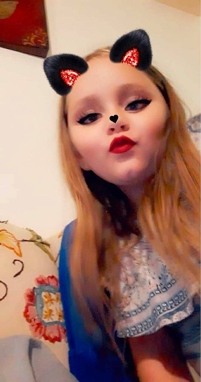 Nancy Sue is registered to the contest to win money with this photo: cap, costume_hat, ear, eye, eyelash, fashion_accessory, fashion_design, fawn, happy, head, headpiece, iris, jaw, jewellery, lip, lipstick, long_hair, necklace, person, street_fashion