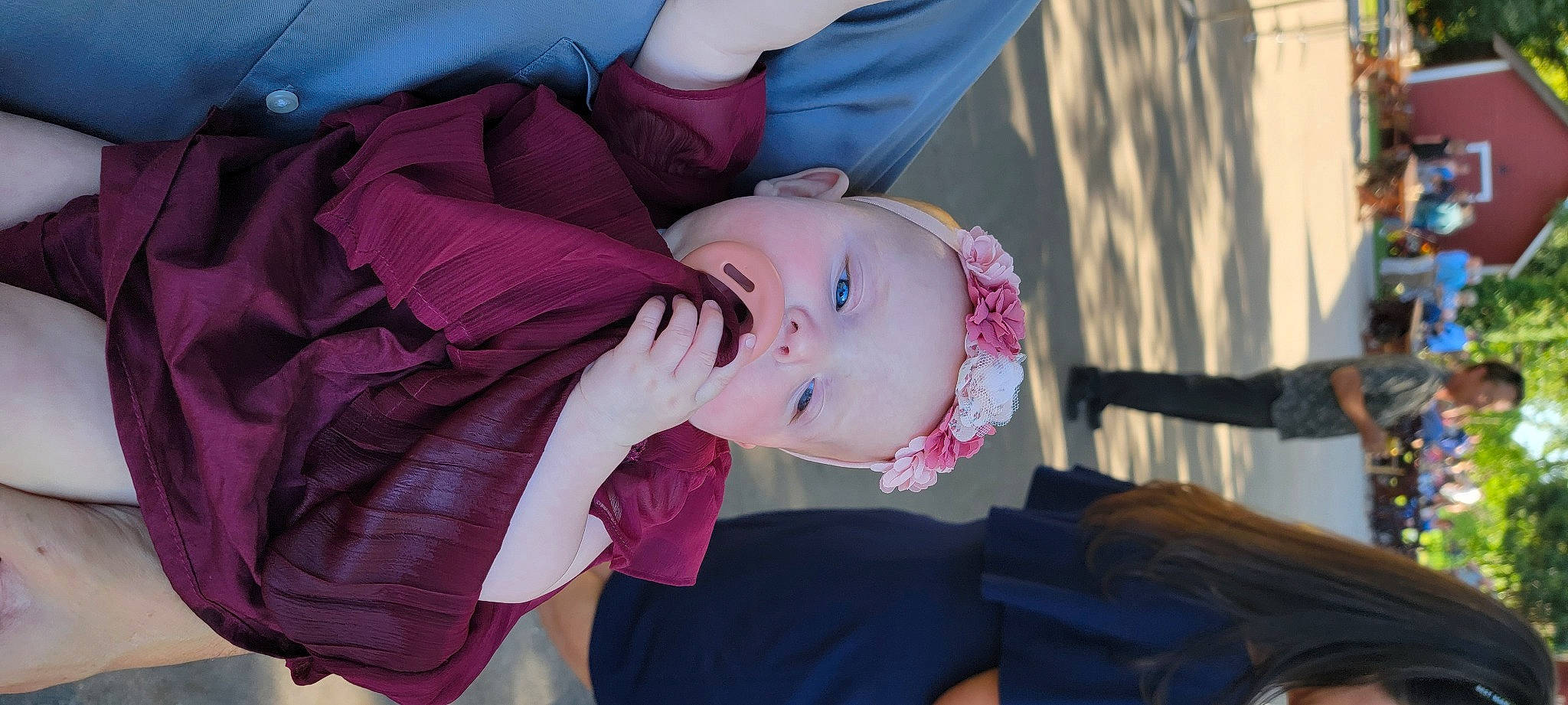 Shannon is registered to the contest to win money with this photo: baby, baby_products, black_hair, child, dress, eyebrow, eyelash, fashion_accessory, happy, hat, human_body, lip, magenta, nose, person, pink, plant, purple, sitting, toddler
