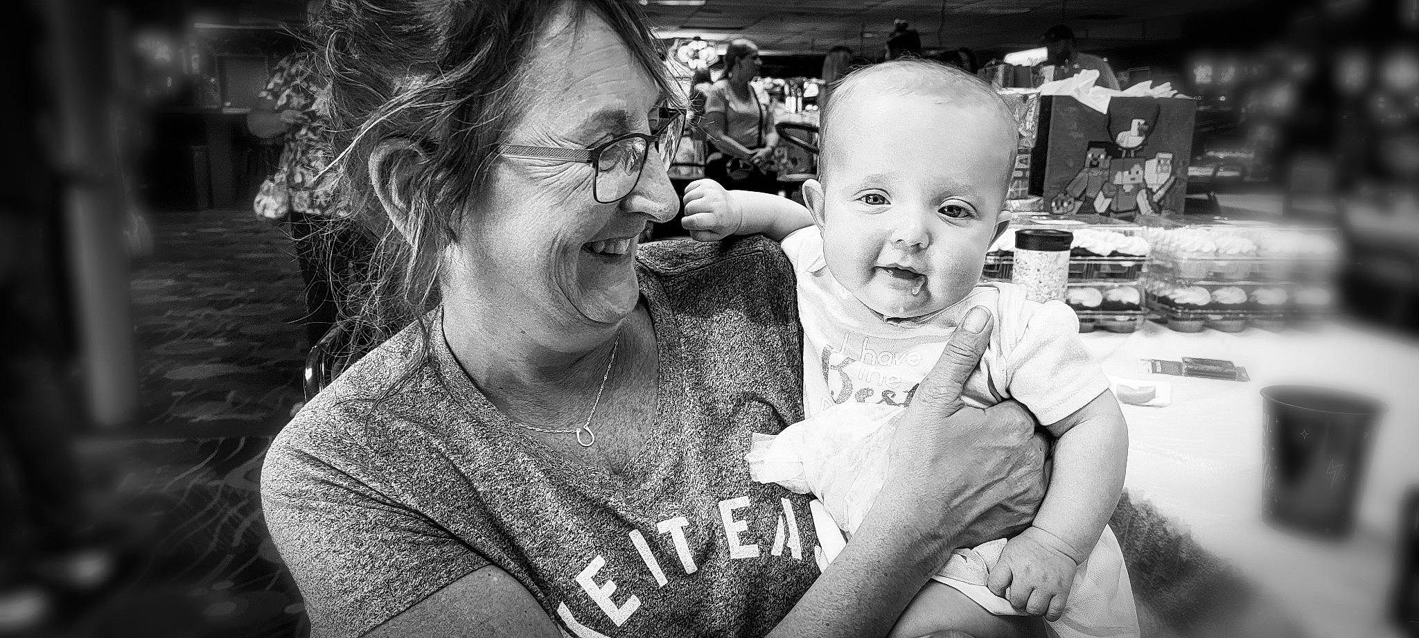 Shannon joined the competition — help win amazing prizes! baby, black, black_and_white, eyewear, face, flash_photography, fun, gesture, glasses, happy, head, interaction, iris, joy, monochrome, monochrome_photography, person, skin, smile, style