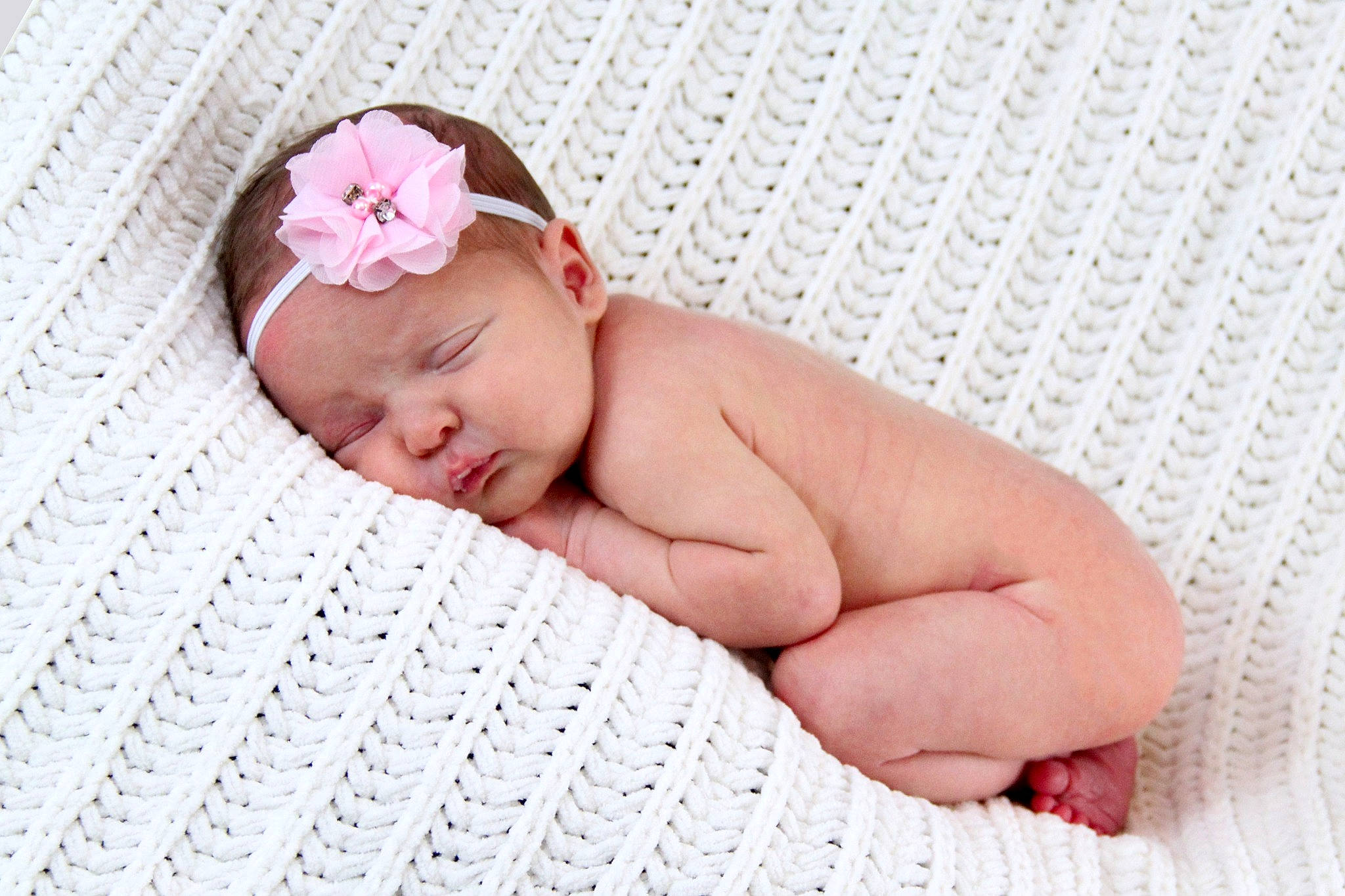 Shannon joined the competition — help win amazing prizes! baby, baby_sleeping, baby_toddler_clothing, bedding, child, comfort, fashion_accessory, foot, hair_accessory, hand, headband, headpiece, headwear, linens, nail, pattern, person, petal, pink, skin