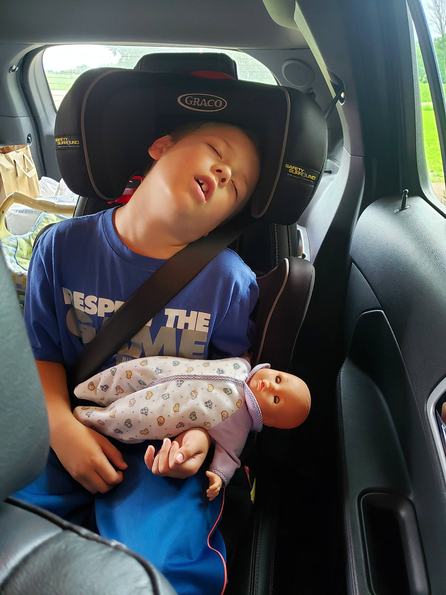 Caleb is registered to the contest to win money with this photo: baby_in_car_seat, car_seat, car_seat_cover, child, family_car, person, seat_belt, vehicle, vehicle_door