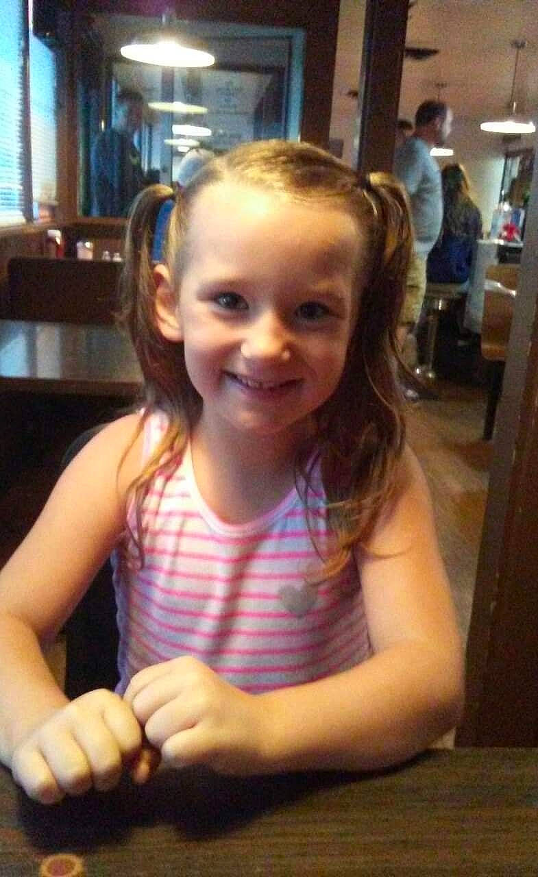 Jacee joined the competition — help win amazing prizes! blond, chair, cheek, chin, event, finger, fun, gesture, hairstyle, happy, joy, leisure, long_hair, person, room, skin, smile, standing, t_shirt, tableware