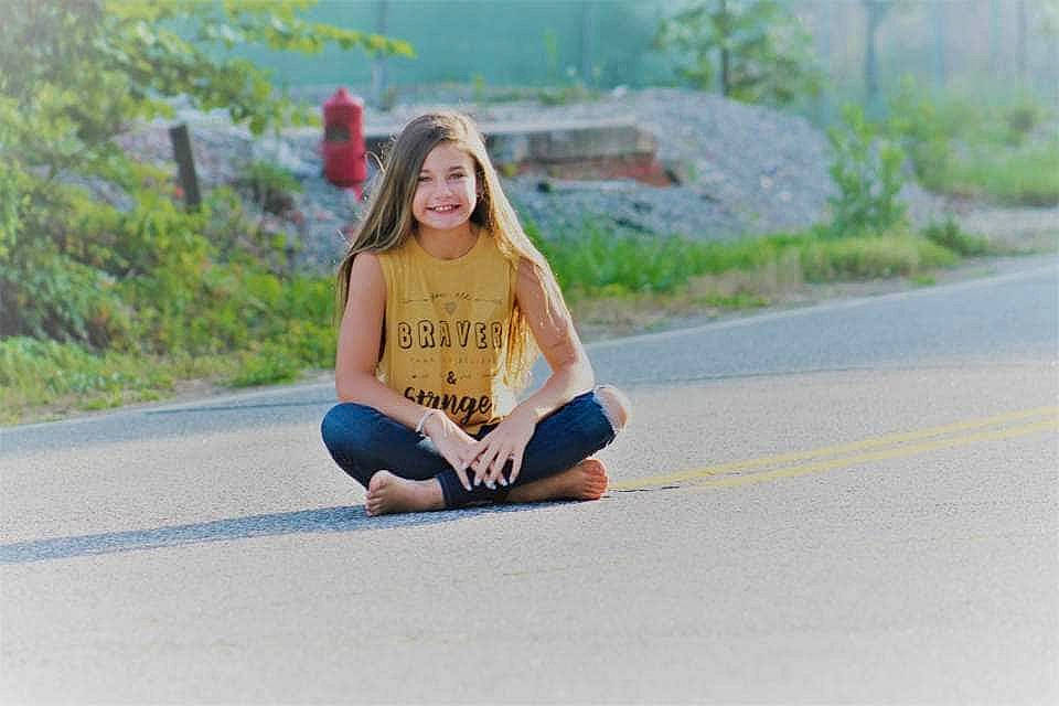 Kayleigh joined the competition — help win amazing prizes! asphalt, beauty, blond, footwear, fun, infrastructure, jeans, joint, joy, knee, leisure, long_hair, person, photography, recreation, road, shoe, sitting, smile, summer