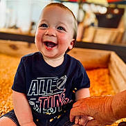 Ripp joined the competition — help win amazing prizes! baby, blue_shirt, blurred_background, bright, casual_clothing, child, corn, cute, face, hand, happy, holding_hand, indoor, portrait, shirt, shorts, sitting, skin, smiling, wooden_box