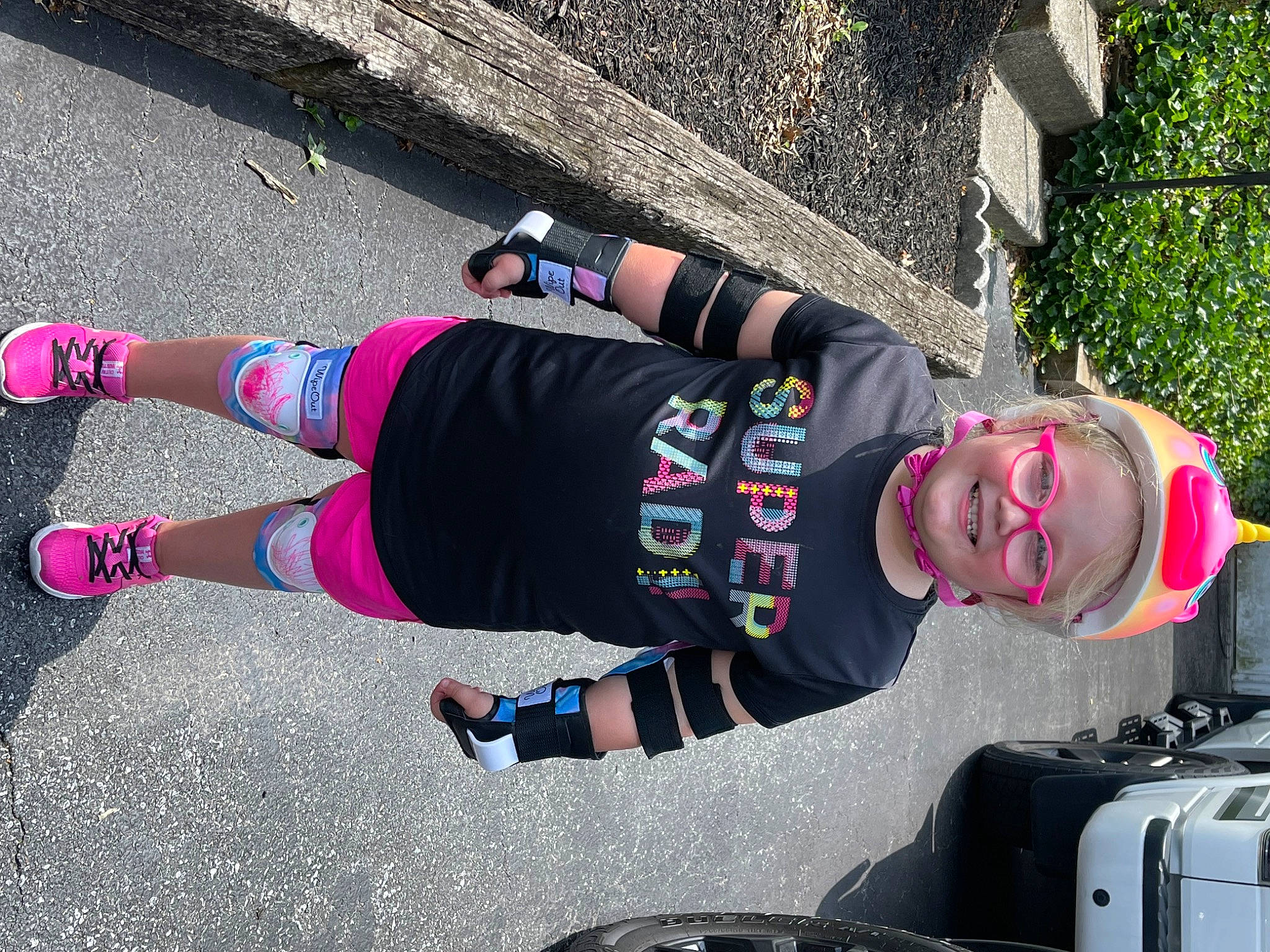 Blakeley joined the competition — help win amazing prizes! active_pants, asphalt, automotive_tire, competition_event, eyewear, fun, glove, helmet, human_leg, joy, knee, leisure, magenta, person, personal_protective_equipment, recreation, shorts, smile, sports, sportswear