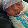 Zaylee is registered to the contest to win money with this photo: baby, beanie, blanket, bonnet, cap, clothing, face, glove, hat, head, hood, newborn, person, photography, portrait, quilt, sleeping