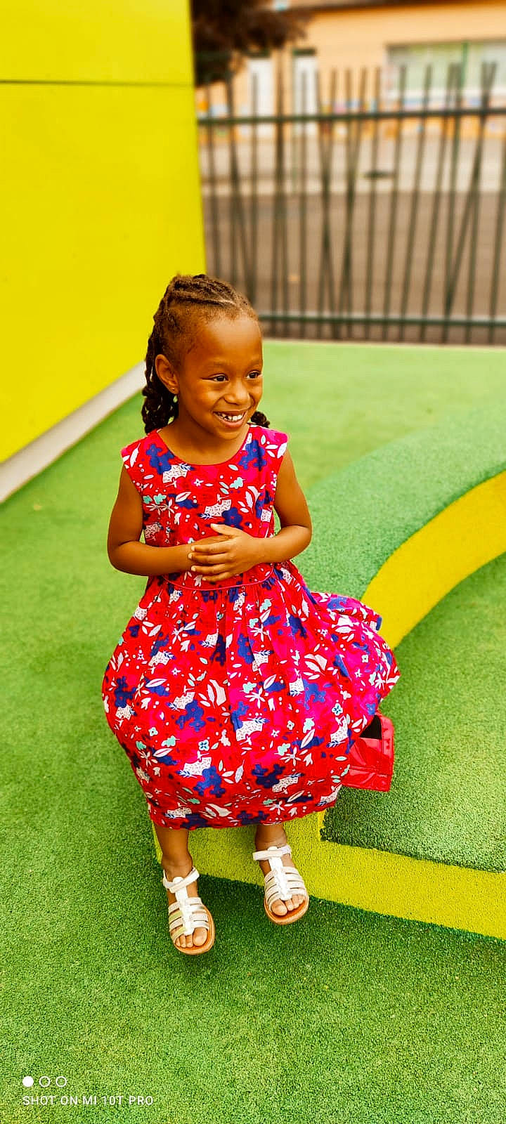 Cassie participe au concours pour gagner de l'argent avec cette photo : baby_toddler_clothing, day_dress, dress, fashion, flooring, fun, grass, hairstyle, happy, human_leg, joy, leisure, magenta, one_piece_garment, person, pink, plant, recreation, sandal, smile