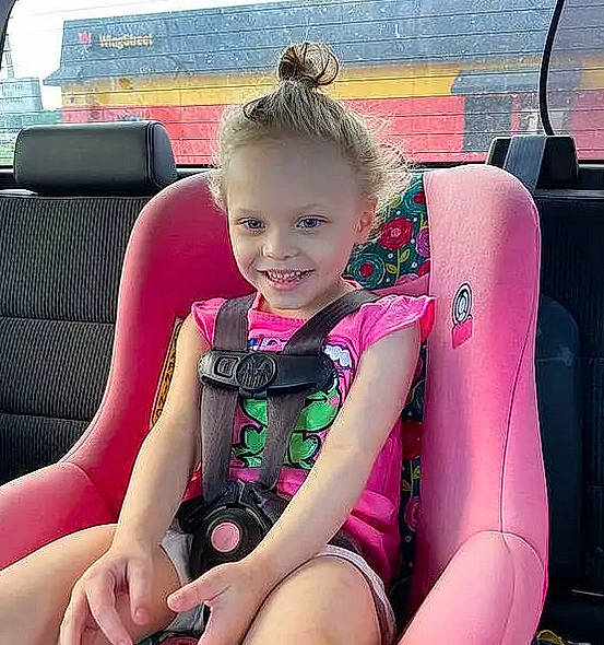 Zoey Taylor joined the competition — help win amazing prizes! auto_part, automotive_design, automotive_exterior, car_seat, comfort, cool, facial_expression, finger, fun, happy, joy, lap, leisure, motor_vehicle, person, pink, smile, steering_wheel, thigh, toddler