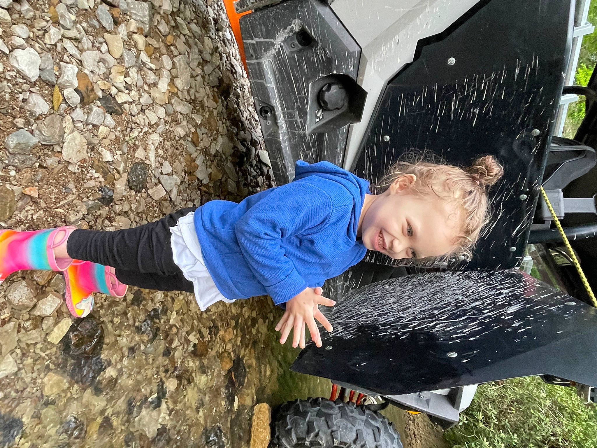 Zoey Taylor is registered to the contest to win money with this photo: active_pants, automotive_tire, child, denim, electric_blue, fun, grass, joy, leisure, people_in_nature, person, play, recreation, soil, sweatpant, t_shirt, toddler, vacation