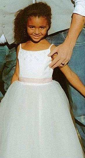 Addilyn is registered to the contest to win money with this photo: blond, bridal_accessory, bridal_party_dress, child, day_dress, dress, embellishment, fashion_design, formal_wear, gesture, gown, happy, joy, long_hair, neck, one_piece_garment, person, shoulder, sleeve, smile