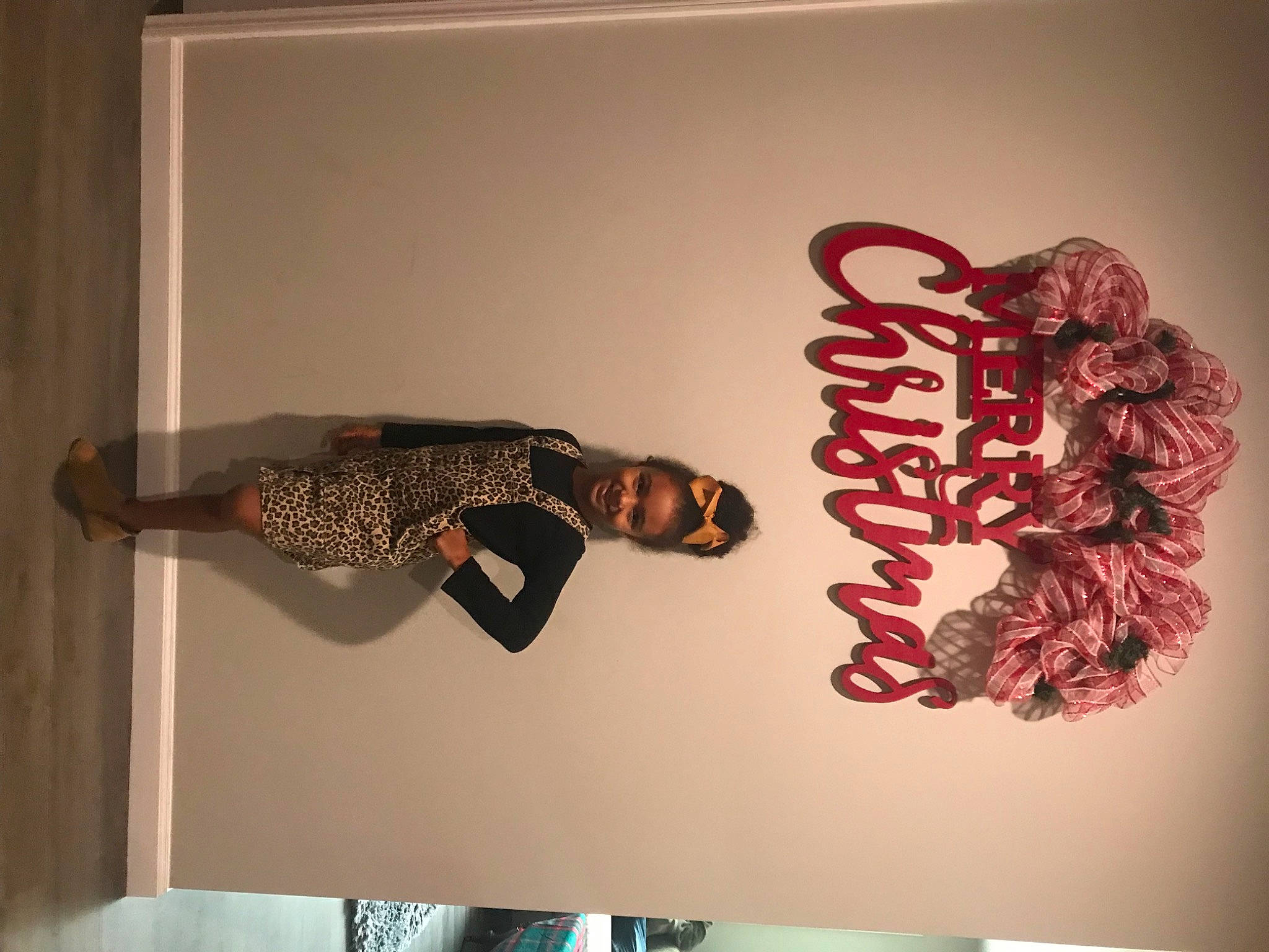 Addilyn is registered to the contest to win money with this photo: advertising, art, carmine, dress, elbow, event, eyewear, fashion_design, font, graphics, joy, logo, magenta, pattern, person, room, smile, visual_arts, waist, wall