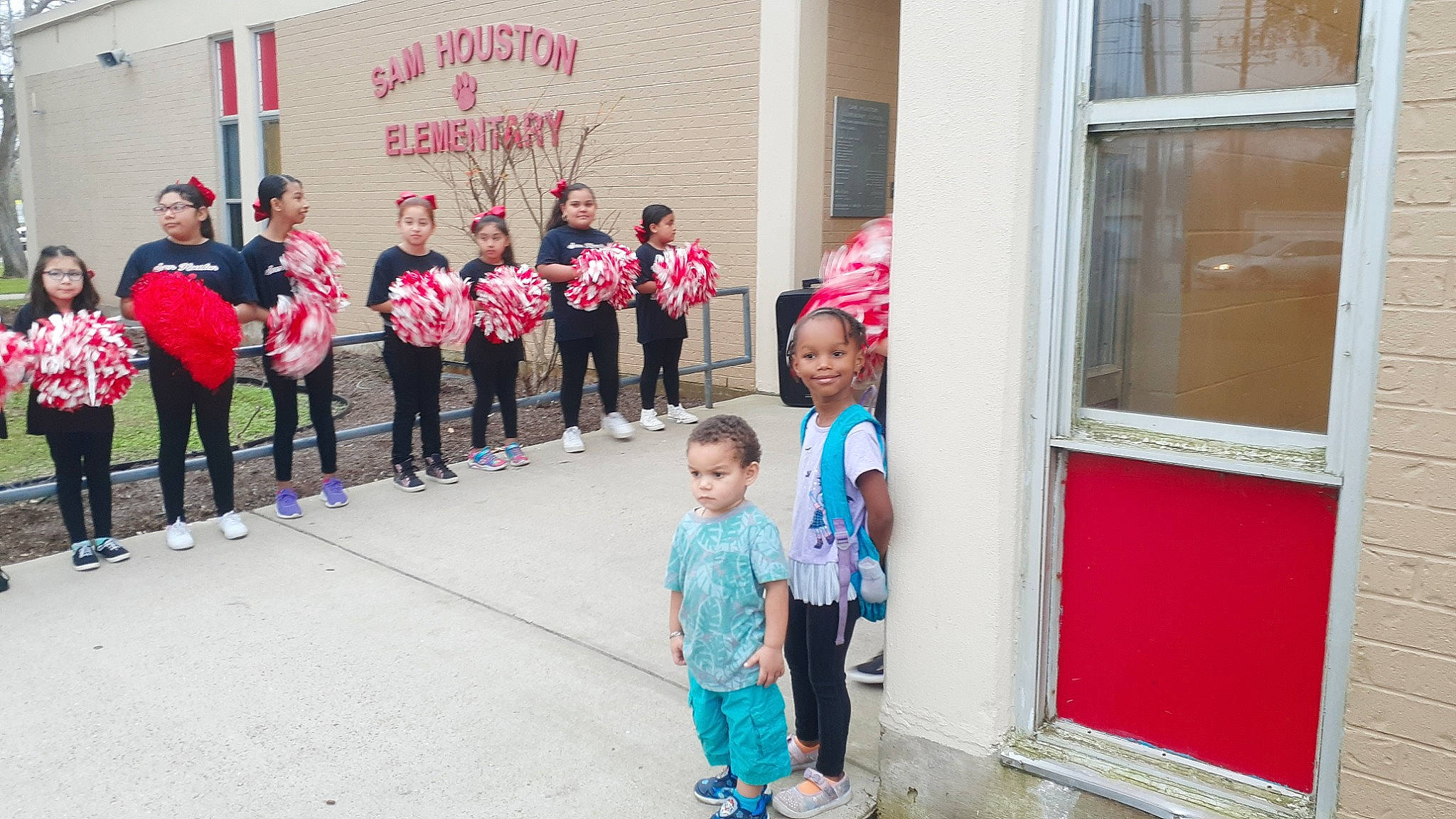 Matthew is registered to the contest to win money with this photo: child, community, event, house, joy, kindergarten, person, school, smile, team