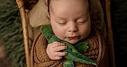 Noah joined the competition — help win amazing prizes! baby, baby_boy, child, cozy, cute, foot, green_plush, hand, indoors, infant, knit_blanket, newborn, peaceful, plush_toy, portrait, resting, sleeping, soft_texture, wicker_basket, wrapped