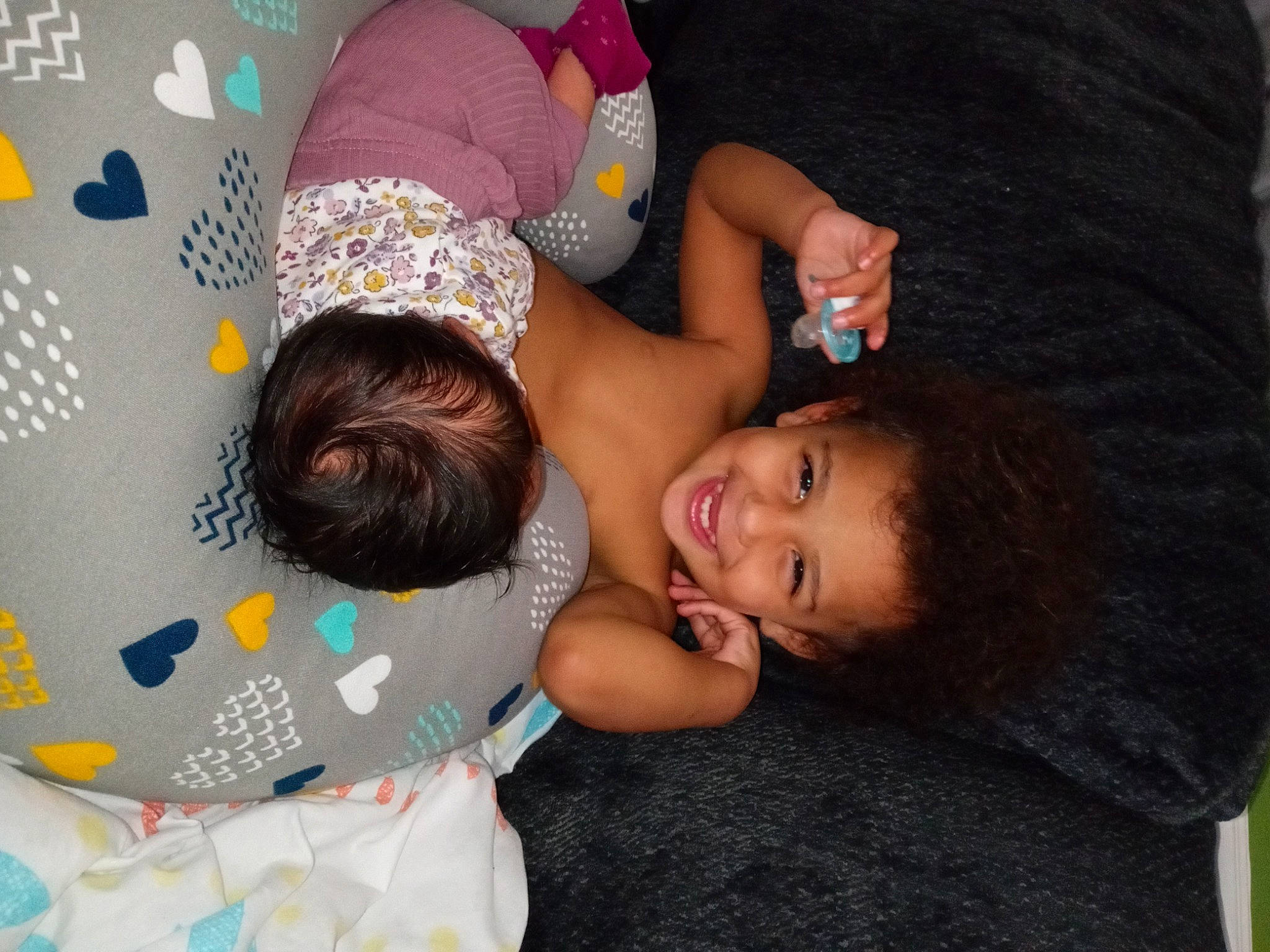 Kensleigh is registered to the contest to win money with this photo: adaptation, baby, baby_toddler_clothing, child, comfort, event, fun, hairstyle, happy, joy, leisure, party, pattern, person, play, room, sitting, smile, t_shirt, thigh