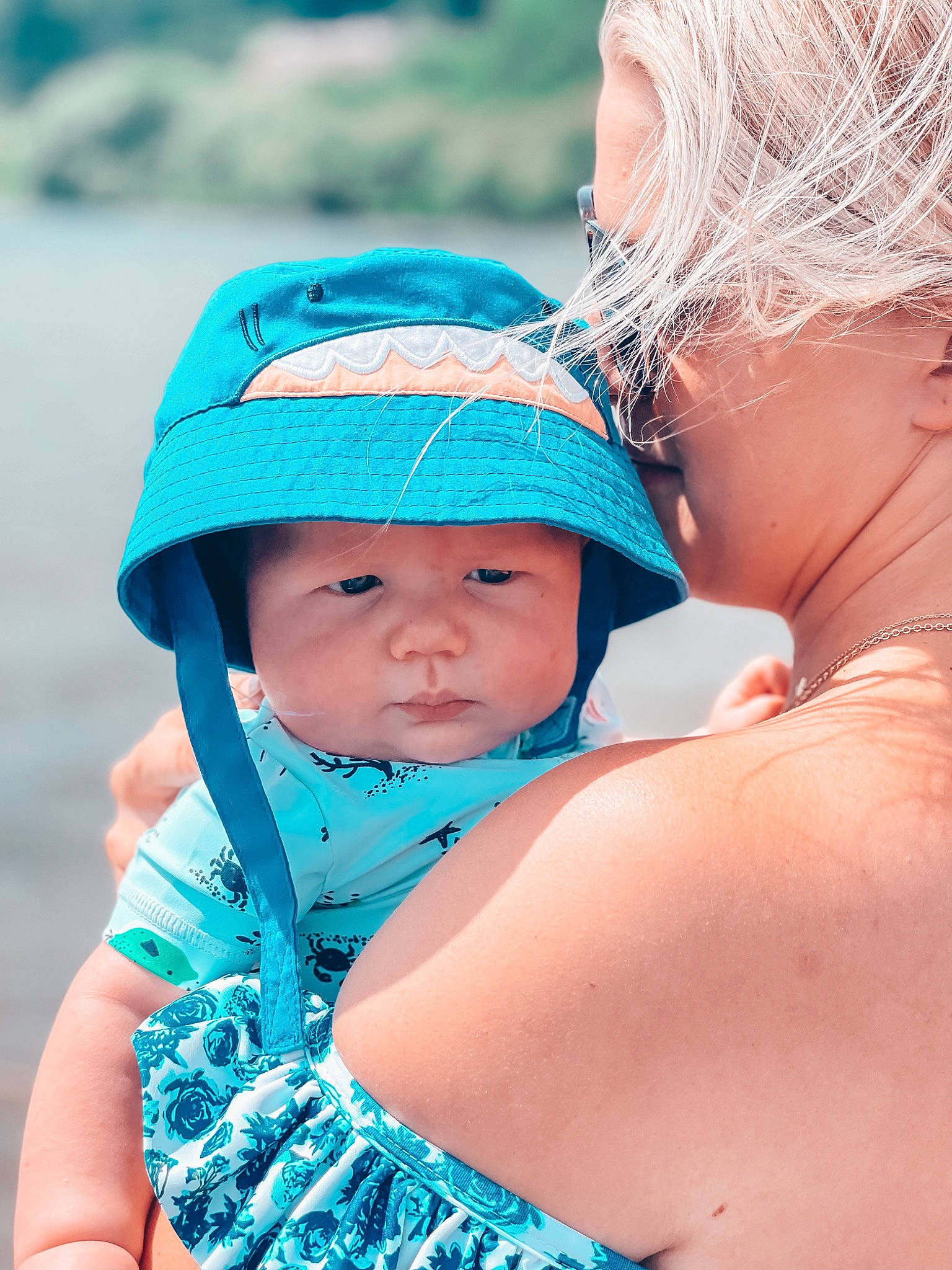 Cole is registered to the contest to win money with this photo: arm, azure, blue, child, facial_expression, fun, grass, green, happy, headgear, headwear, leisure, mammal, people_in_nature, person, photograph, recreation, skin, summer, sunlight