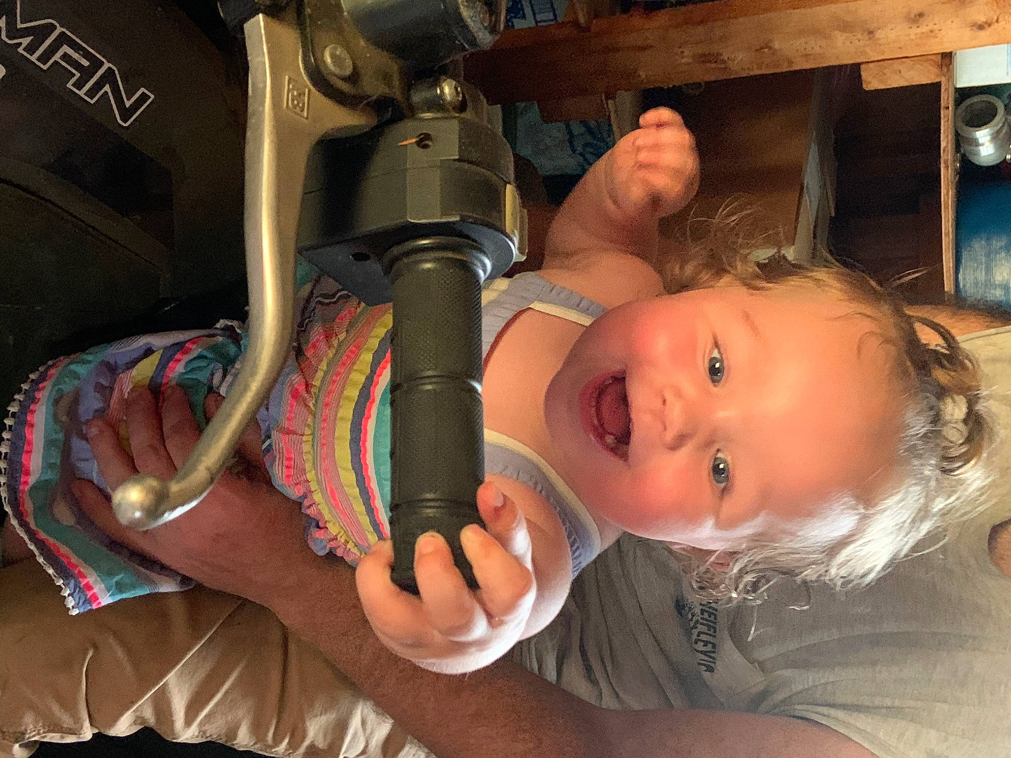 Lily joined the competition — help win amazing prizes! audio_equipment, baby, baby_products, chair, child, ear, eye, finger, fun, iris, machine, nose, people, person, room, sitting, skin, smile, toddler, vacation