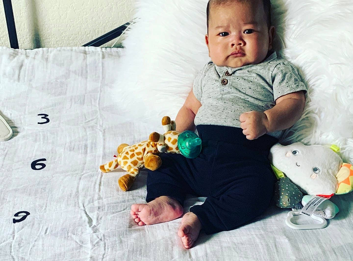 Makaio is registered to the contest to win money with this photo: baby, baby_products, baby_toddler_clothing, baby_toys, child, ear, person, play, product, room, sitting, sleeve, stuffed_toy, t_shirt, textile, toddler, toy