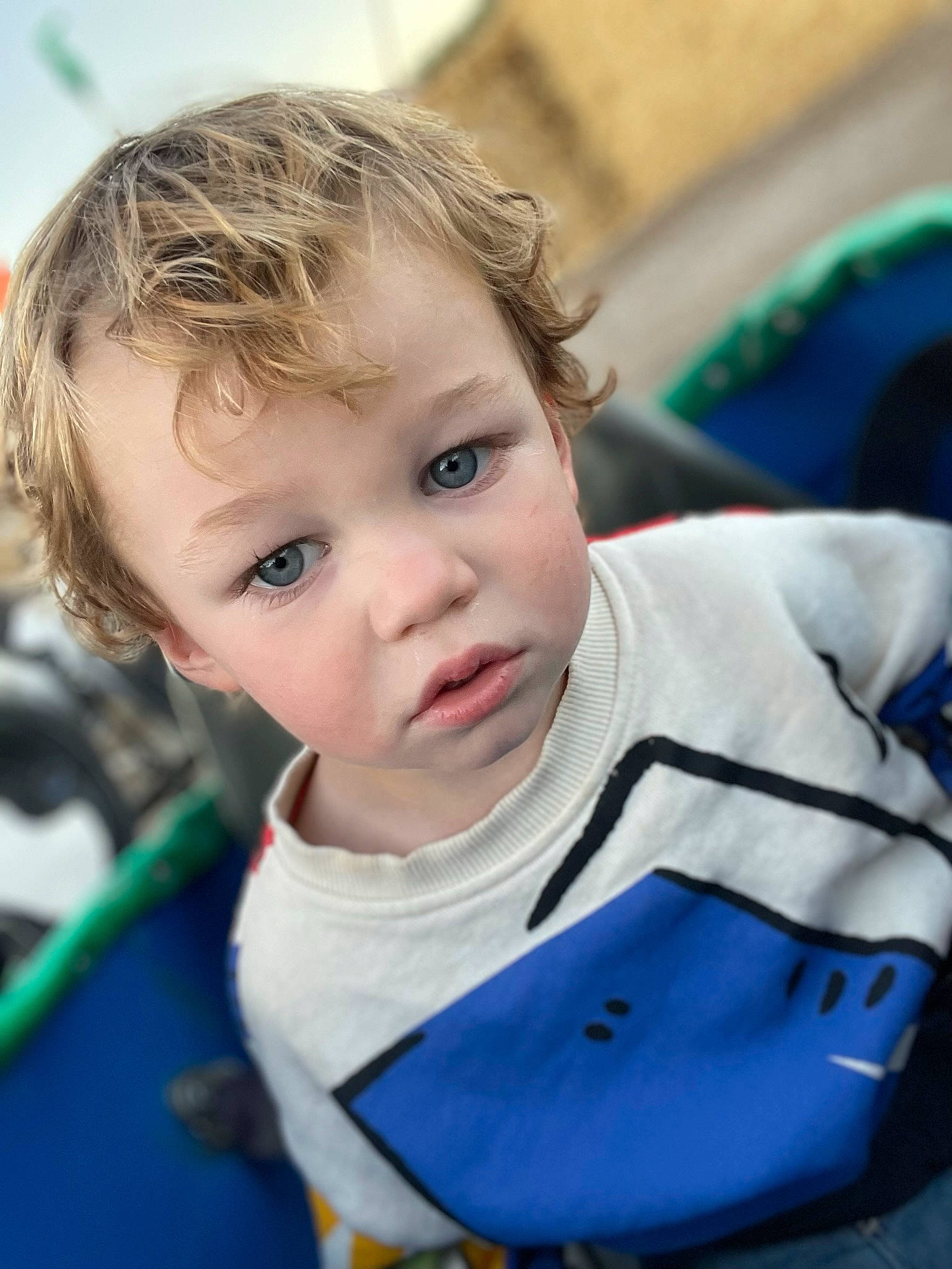 Dallan is registered to the contest to win money with this photo: baby, baby_carriage, baby_products, baby_toddler_clothing, blond, cheek, child, chin, electric_blue, eye, eyebrow, face, happy, iris, leisure, nose, person, sitting, skin, sleeve