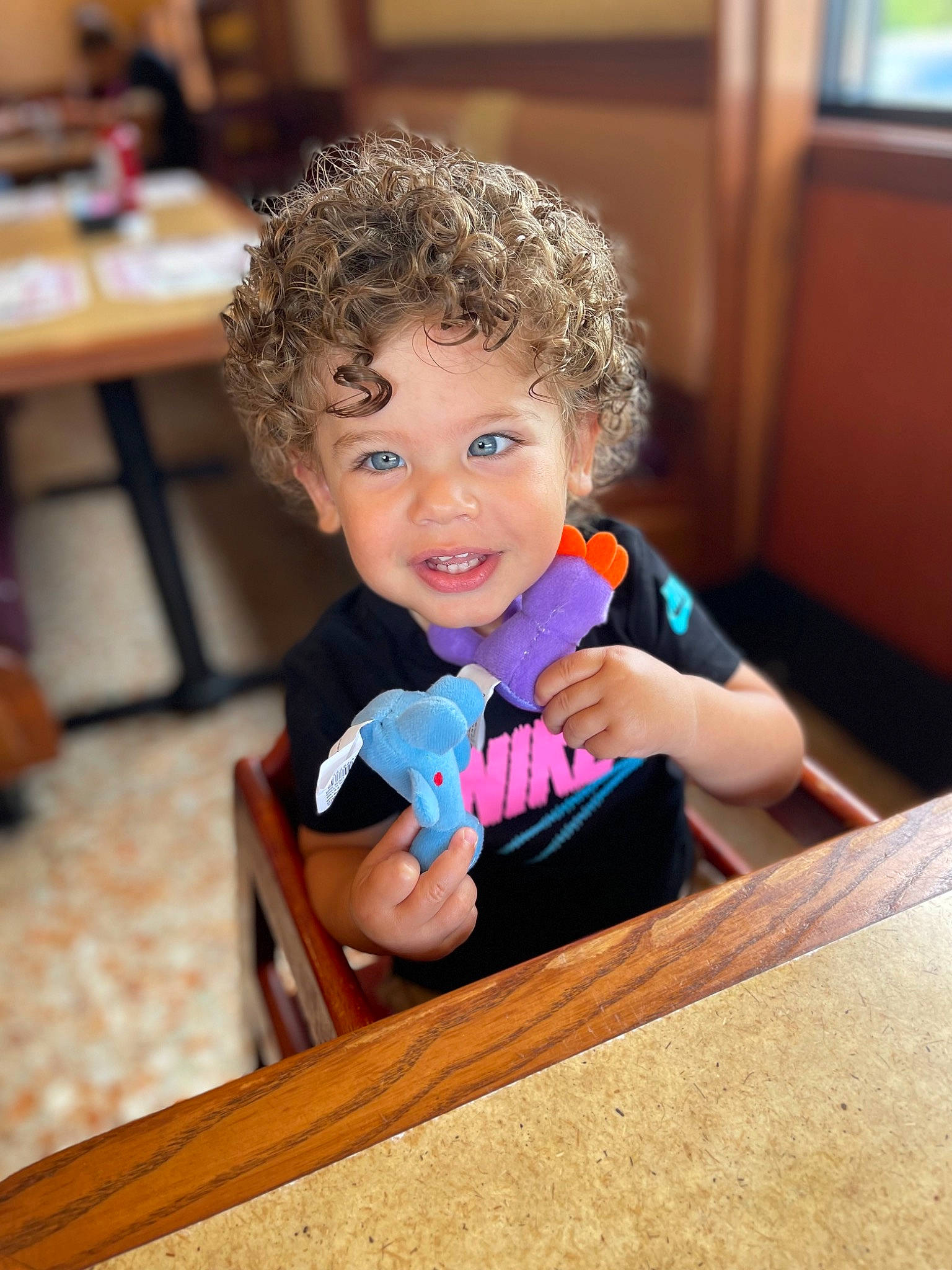 Cameron joined the competition — help win amazing prizes! baby_playing_with_toys, baby_toddler_clothing, chair, cheek, child, eye, flooring, fun, hair, happy, hardwood, head, human_body, iris, nose, person, smile, table, toddler, toy
