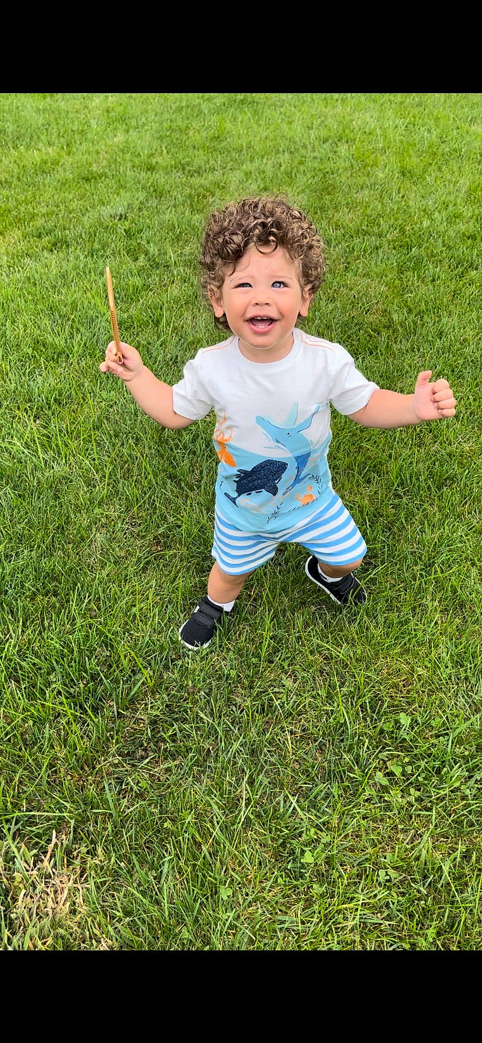 Cameron is registered to the contest to win money with this photo: baby_toddler_clothing, child, finger, fun, gesture, grass, grass_family, grassland, groundcover, happy, lawn, meadow, people_in_nature, person, plant, prairie, recreation, smile, soil, thumb