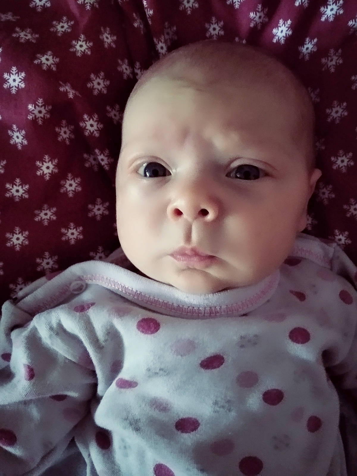 Bianca is registered to the contest to win money with this photo: baby, baby_toddler_clothing, cheek, chin, clothing, dress, eye, eyebrow, face, facial_expression, head, human, lip, nose, organ, outerwear, person, product, skin, sleeve