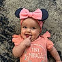baby, infant, smiling, pink_clothing, headband, bow, finger_in_mouth, carpet, cute, child, happy, toddler, portrait, indoor, playful, person, apparel, fashion, face, expression