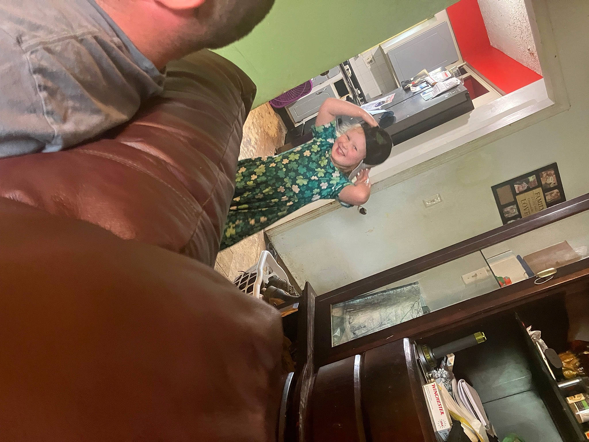 Josie joined the competition — help win amazing prizes! ceiling, chest, comfort, elbow, electronic_device, electronics, eyewear, flesh, flooring, fun, headwear, human_leg, joy, machine, person, room, t_shirt, thigh, wood, wrist