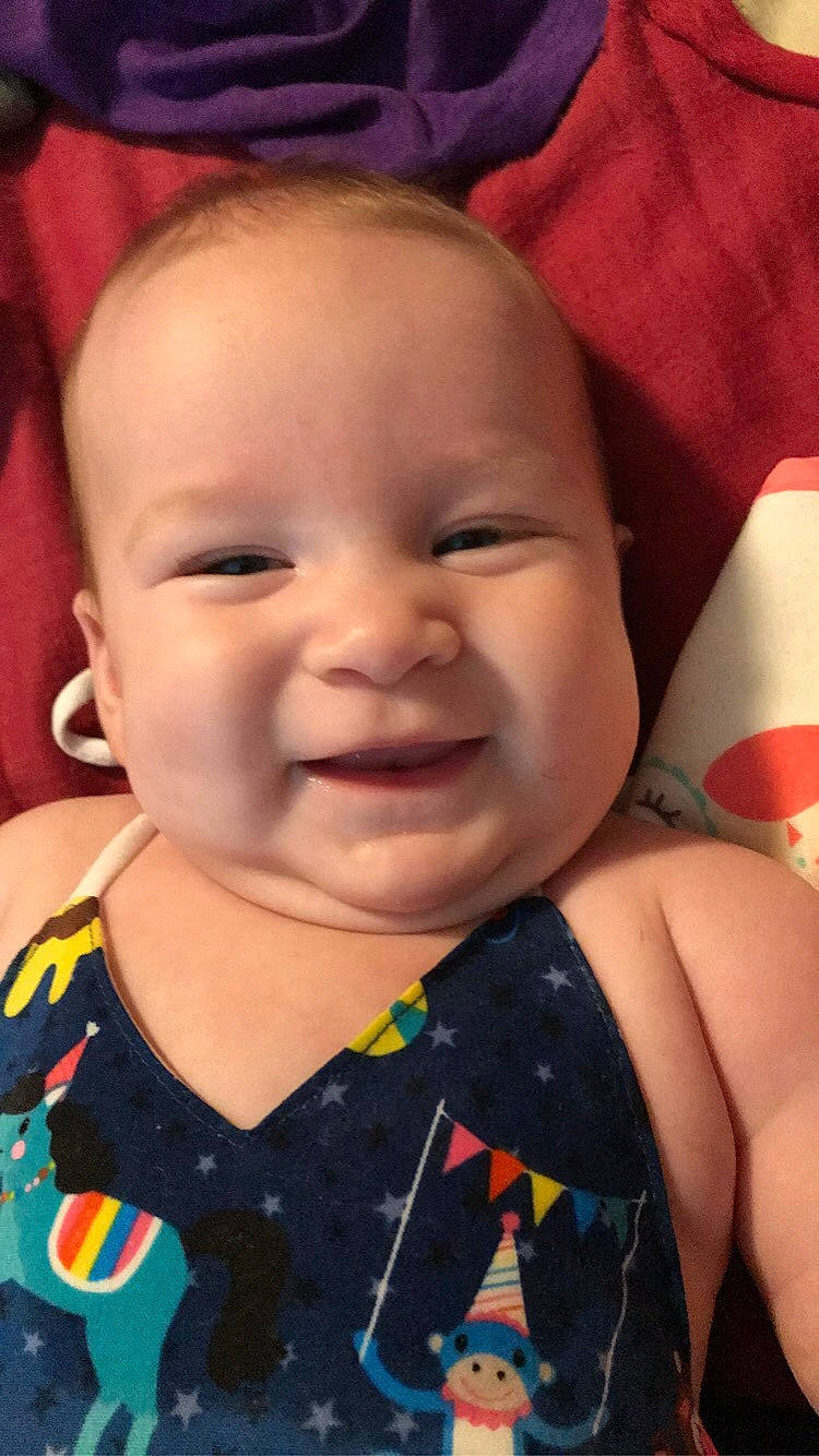 Adaline is registered to the contest to win money with this photo: baby, baby_toddler_clothing, cheek, chin, eye, eyebrow, face, facial_expression, happy, head, human, iris, lip, mouth, nose, organ, person, product, skin, smile