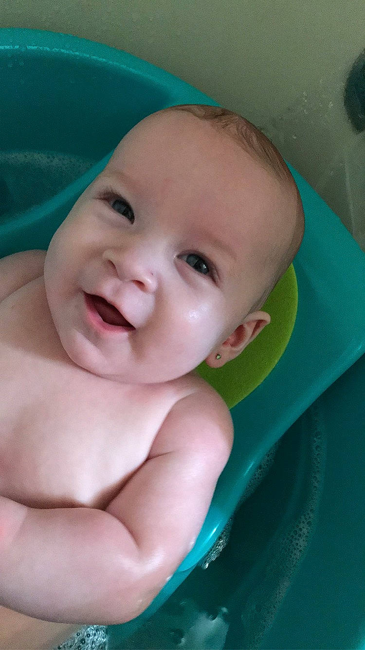 Adaline is registered to the contest to win money with this photo: baby, blue, cheek, chin, eye, eyebrow, eyelash, face, hairstyle, happy, iris, lip, mouth, neck, nose, person, pink, skin, smile, standing