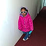 child, girl, sunglasses, pink_jacket, blue_jeans, sneakers, hallway, carpet, white_wall, standing, pose, cool, fashion, indoor, casual, young, person, accessory, toy, hair_bows