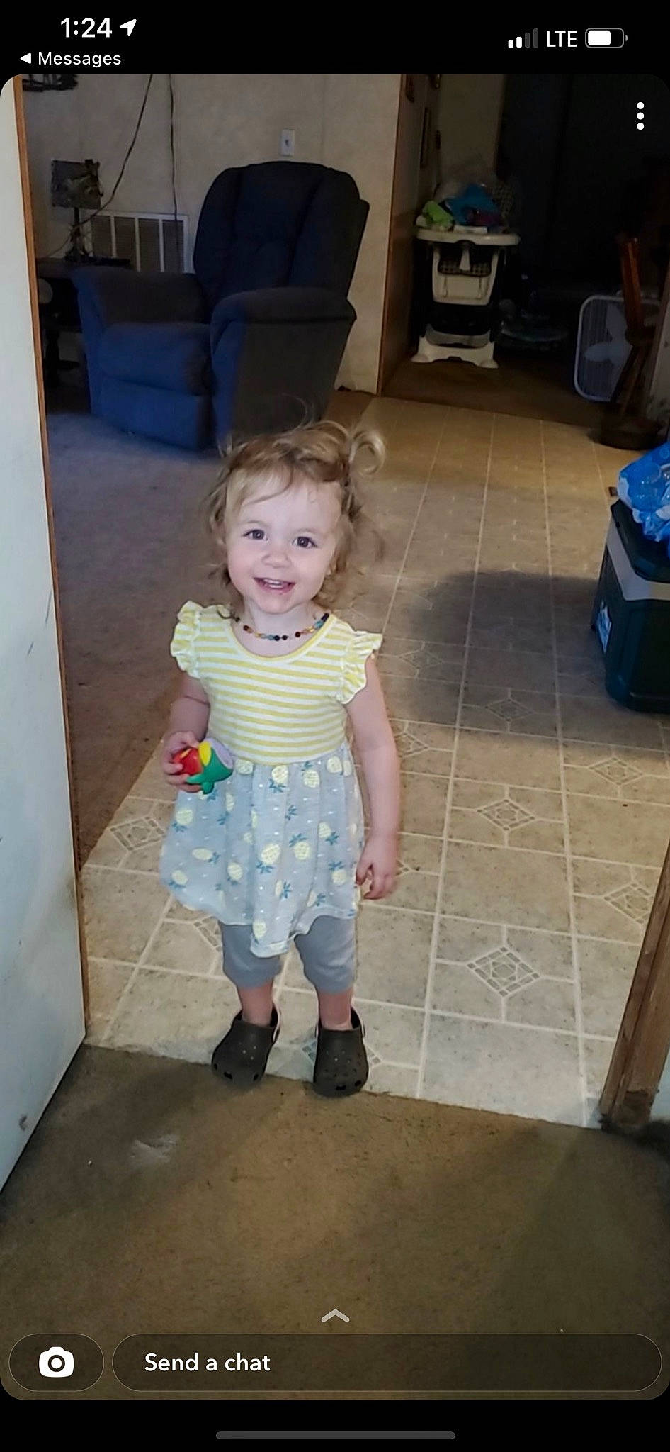 Ember is registered to the contest to win money with this photo: baby, baby_toddler_clothing, child, floor, flooring, foot, fun, hair, hairstyle, hardwood, head, joy, mammal, pattern, person, play, room, sitting, skin, smile