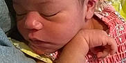 Billie is registered to the contest to win money with this photo: baby, sleeping, headband, pink, arm, clothing, fabric, closeup, peaceful, infant, cute, resting, soft, newborn, person, child, skin, face, hand, nap