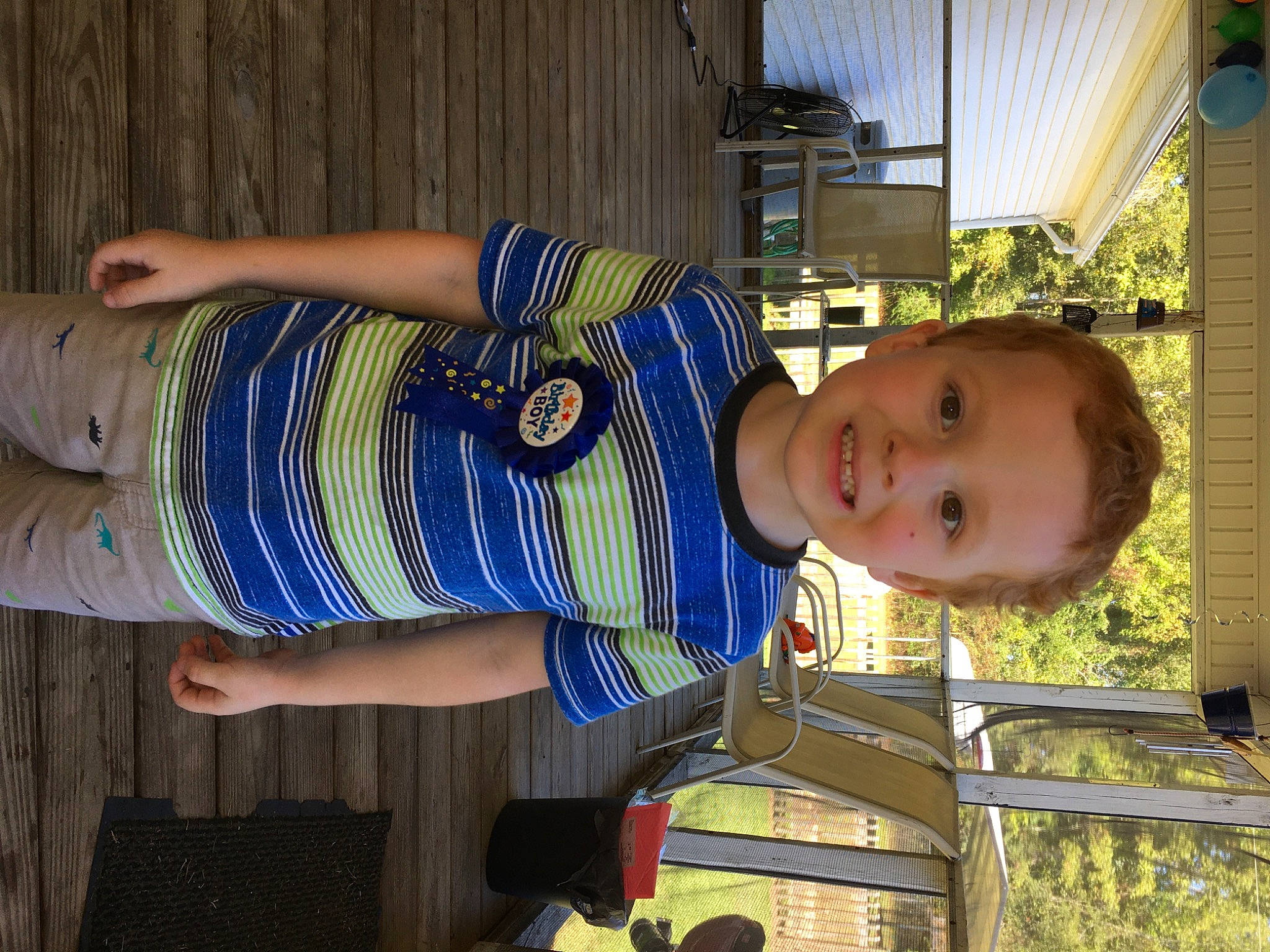 Elyie is registered to the contest to win money with this photo: baby, baby_toddler_clothing, child, electric_blue, fun, human_leg, joy, leisure, pattern, person, plant, sitting, smile, thigh, toddler, tree, vacation, waist, wood