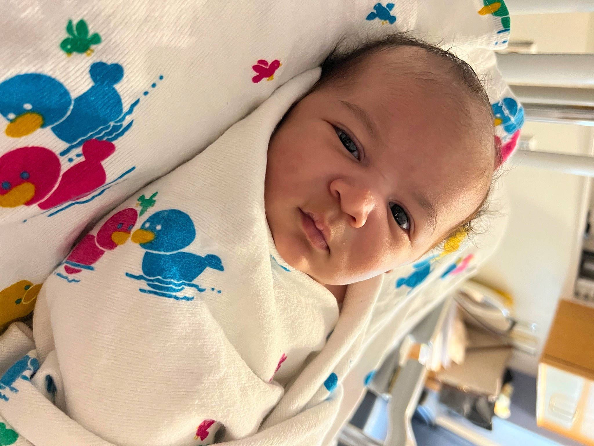 Ezra is registered to the contest to win money with this photo: baby, baby_laughing, baby_products, baby_safety, baby_sleeping, baby_toddler_clothing, cheek, child, comfort, fun, happy, linens, pattern, person, product, room, skin, sleeve, smile, toddler